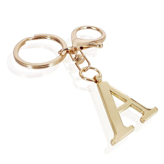 inicial| Elegante colgante para bolso en acabado dorado