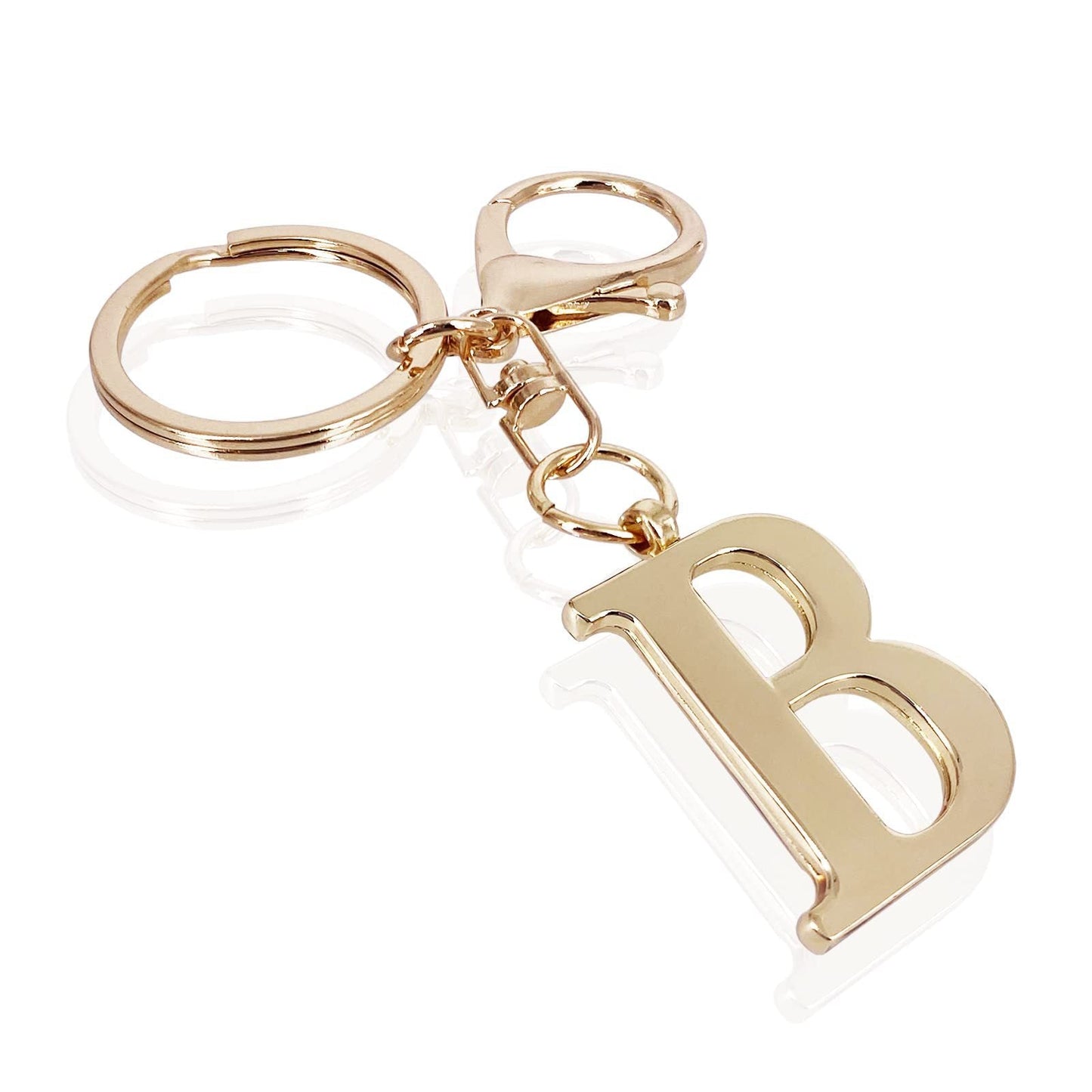 inicial| Elegante colgante para bolso en acabado dorado
