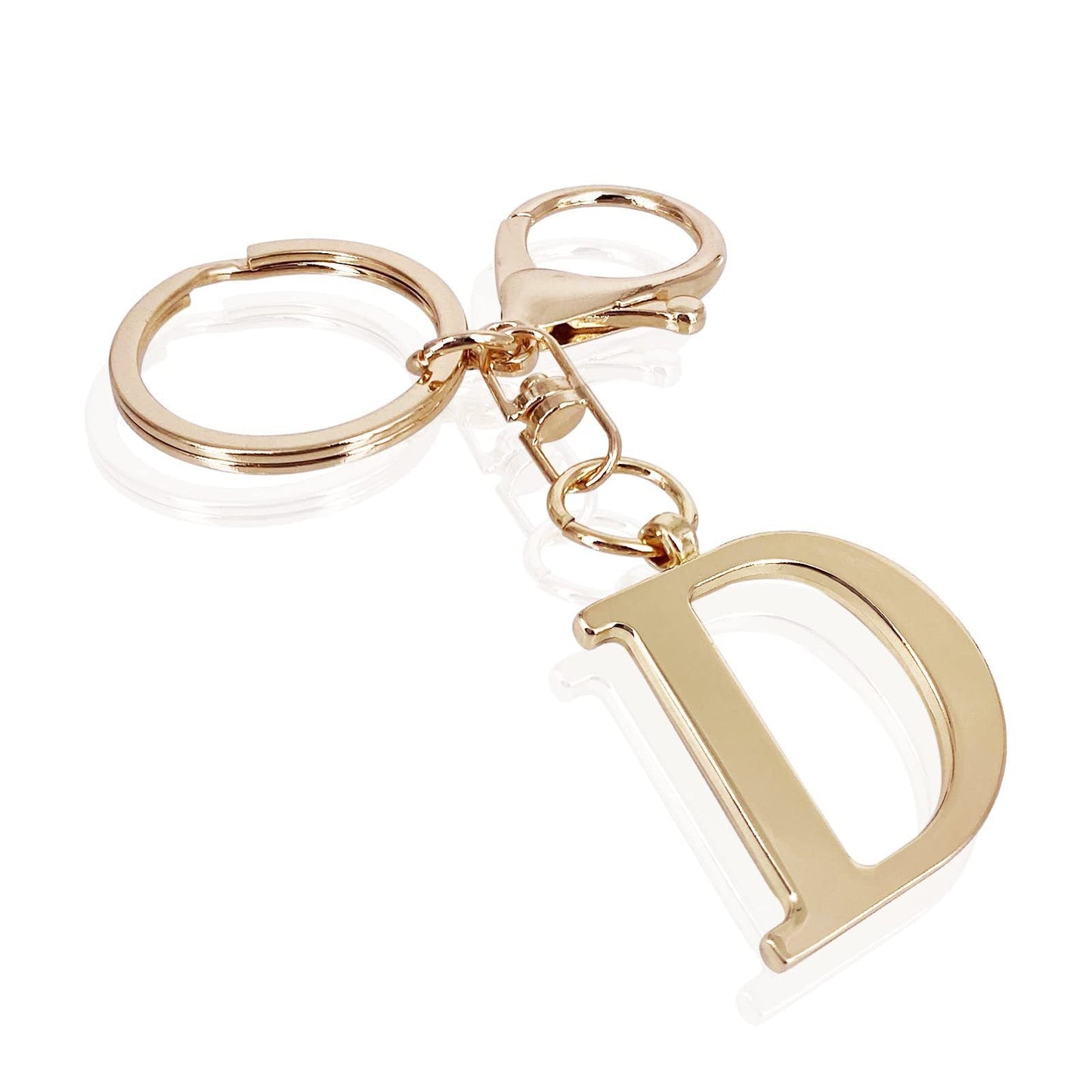 inicial| Elegante colgante para bolso en acabado dorado