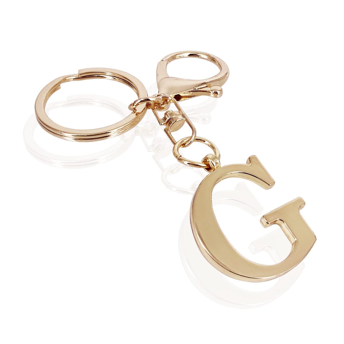 inicial| Elegante colgante para bolso en acabado dorado