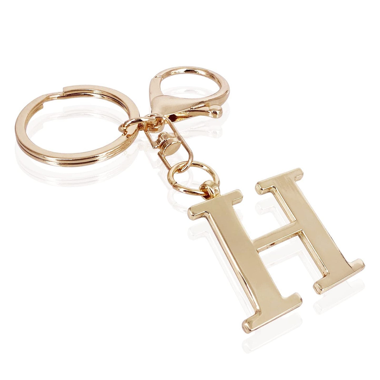 inicial| Elegante colgante para bolso en acabado dorado