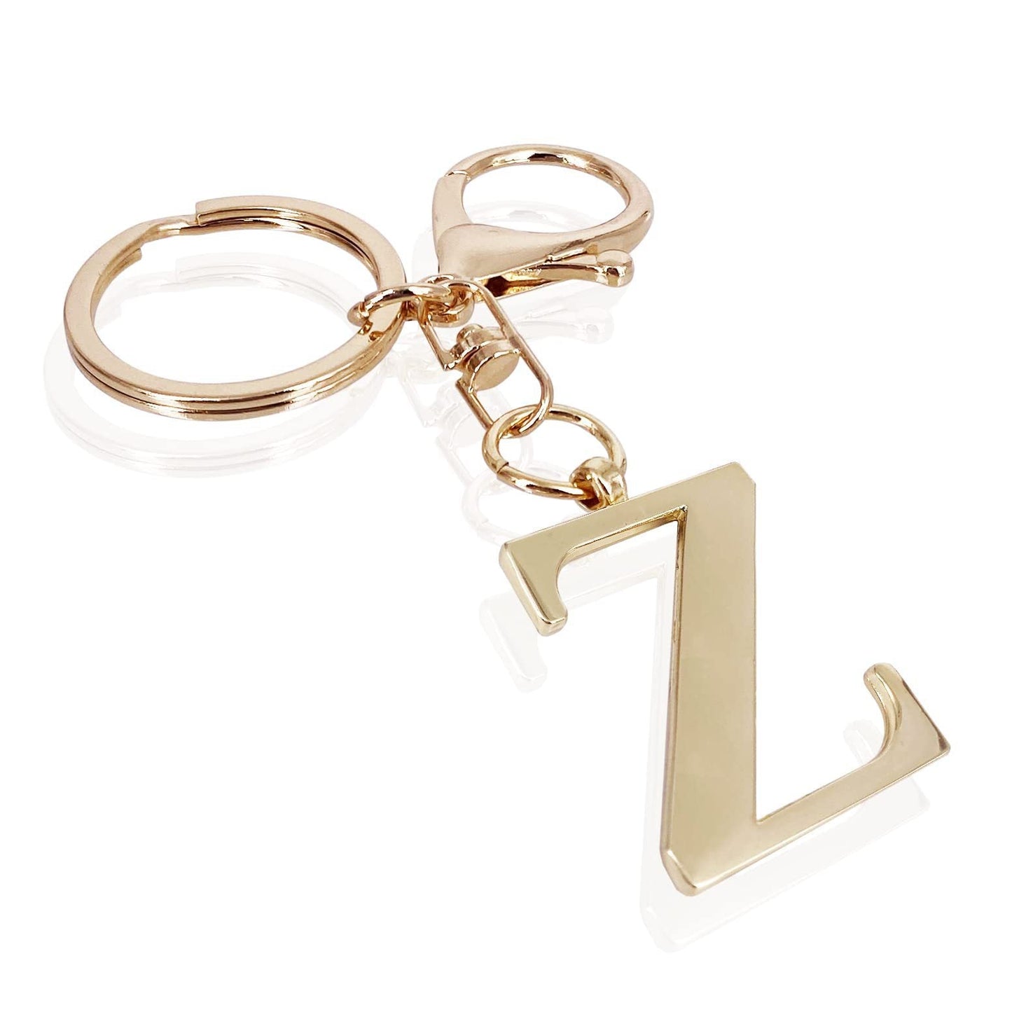 inicial| Elegante colgante para bolso en acabado dorado