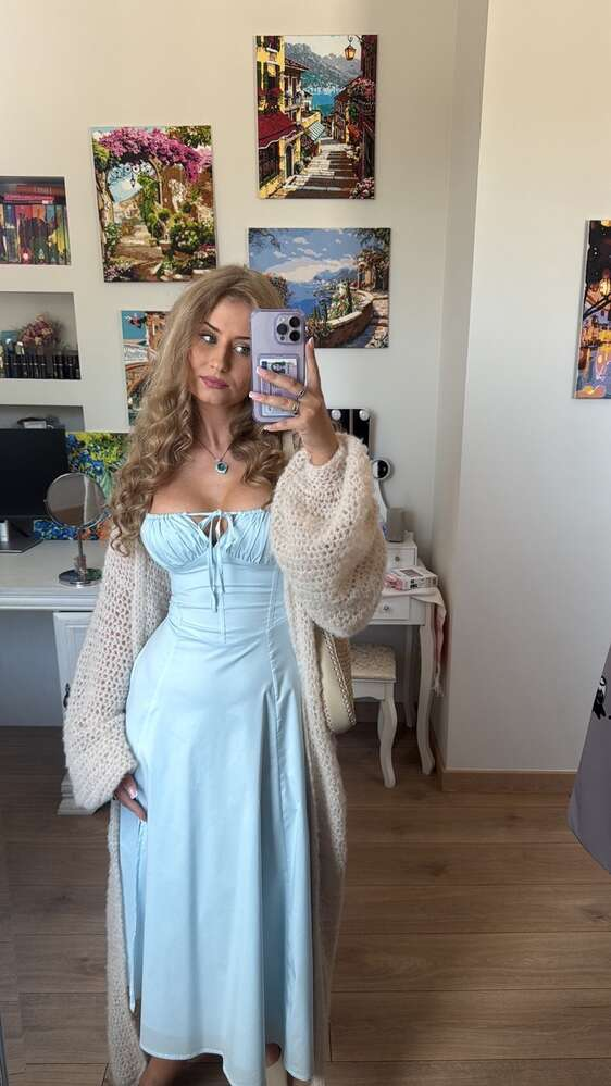 Laura M.